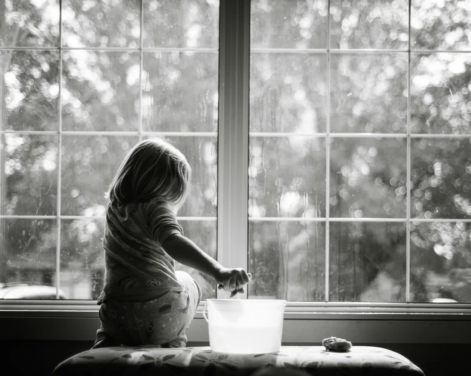 Girl cleaning windows