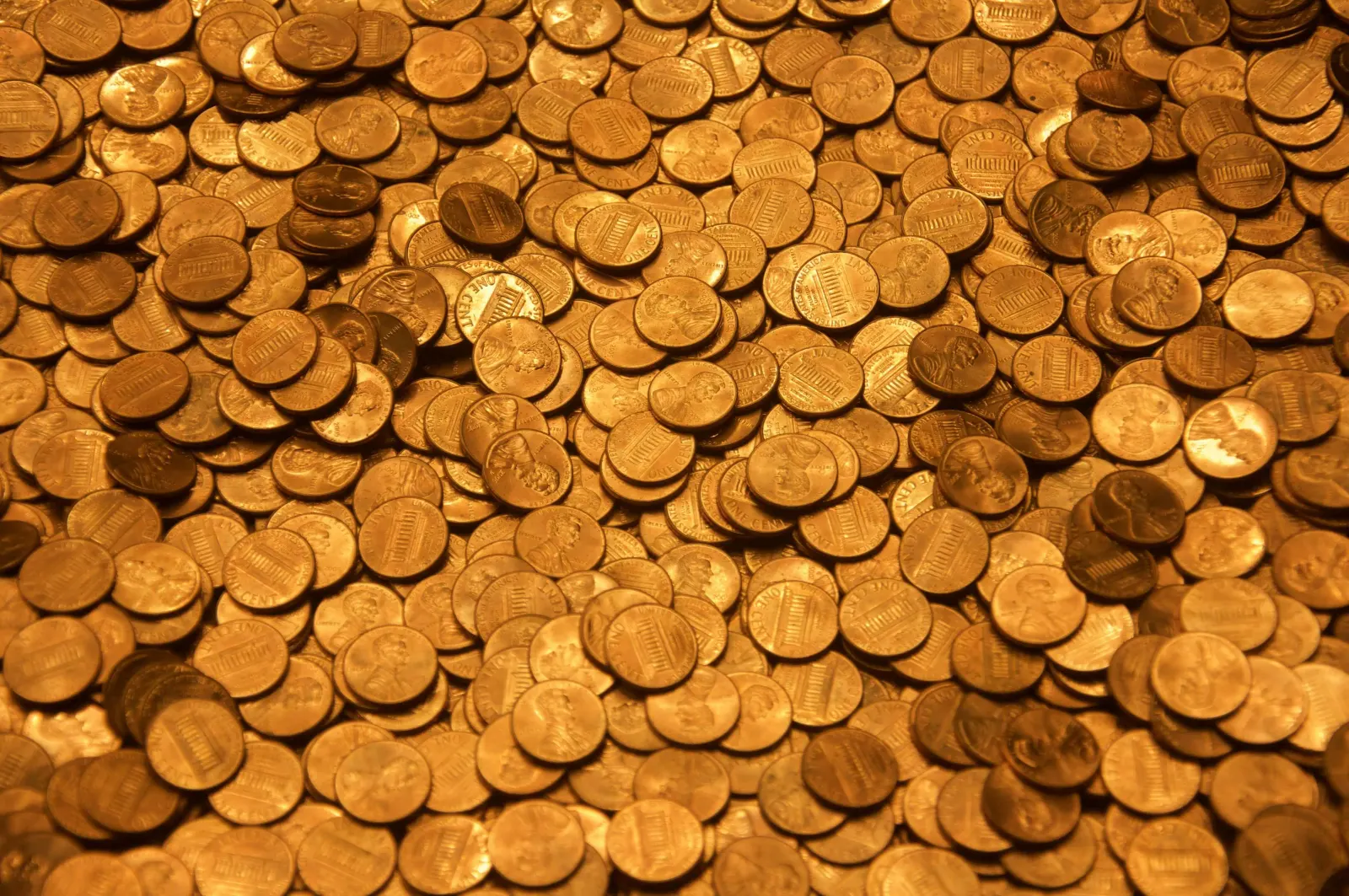 Close-up pile of scattered copper pennies