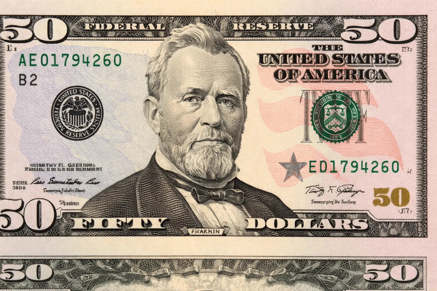 Close-up of a fifty-dollar bill featuring Ulysses S. Grant