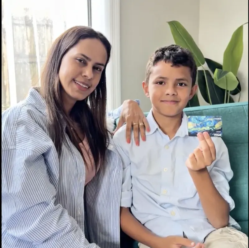 Modak family — mom and son on the couch